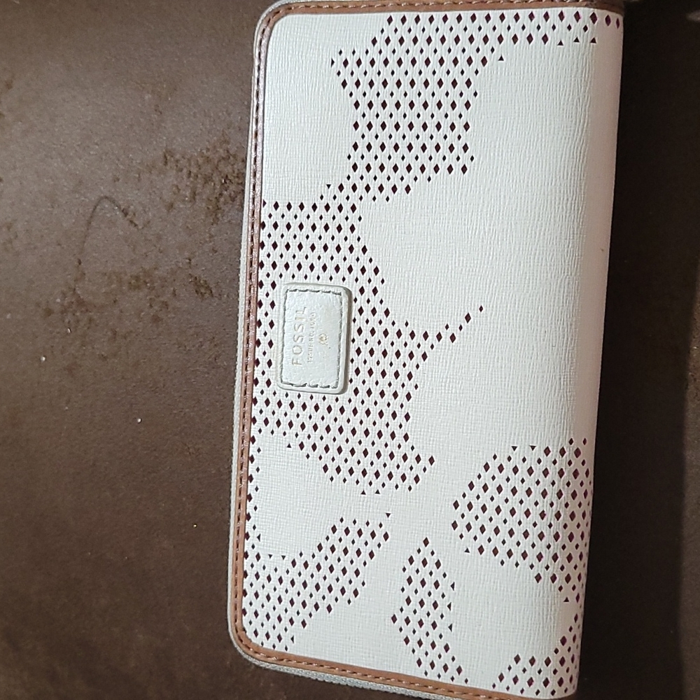 Cream color trimmed in brown fossil wallet